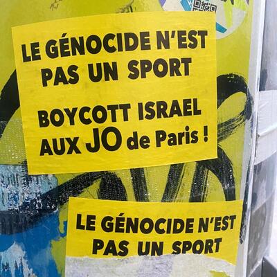 Stickers on post, protesting Israel’s participation in the Olympic Games.